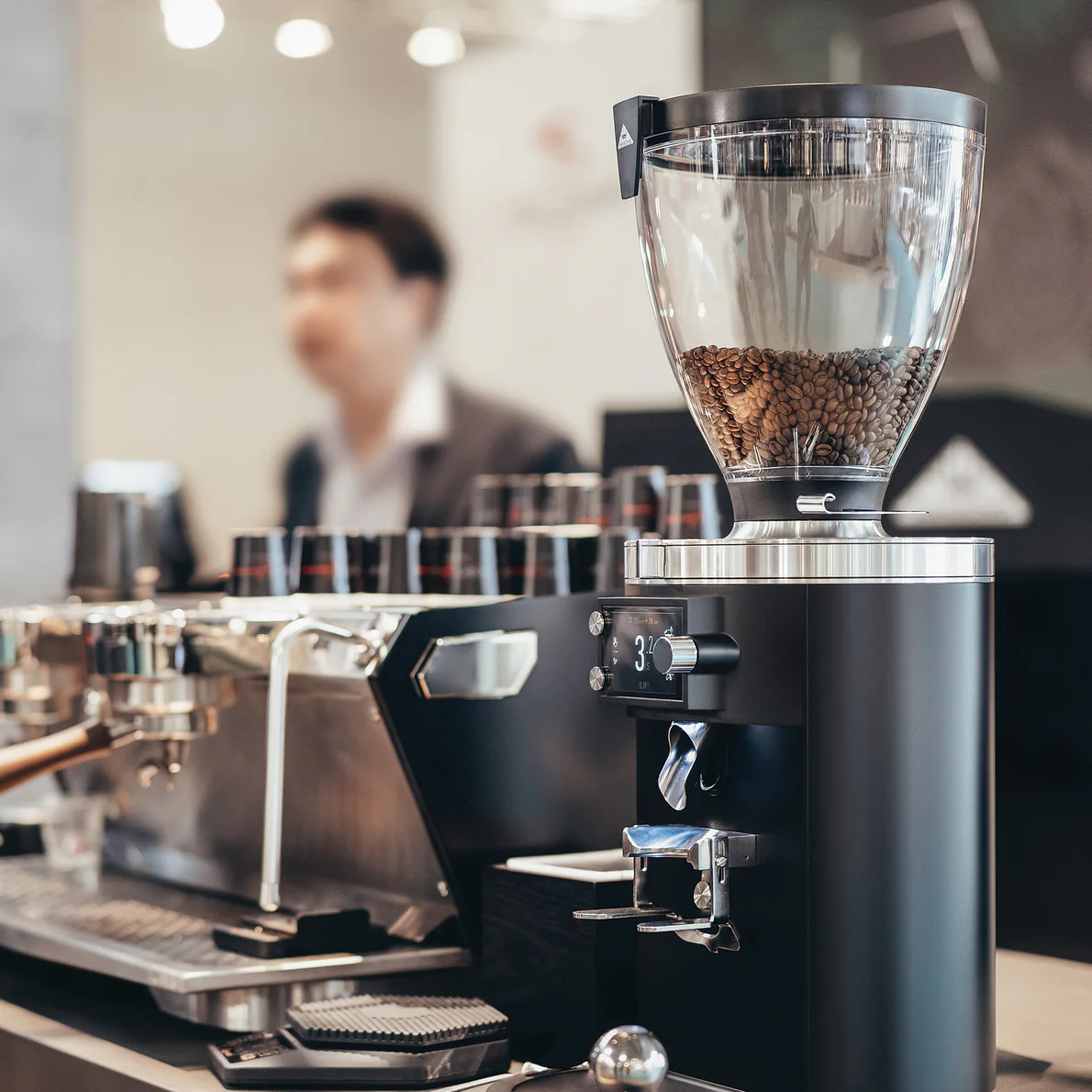 Mahlkönig E80 grinder on a cafe bar