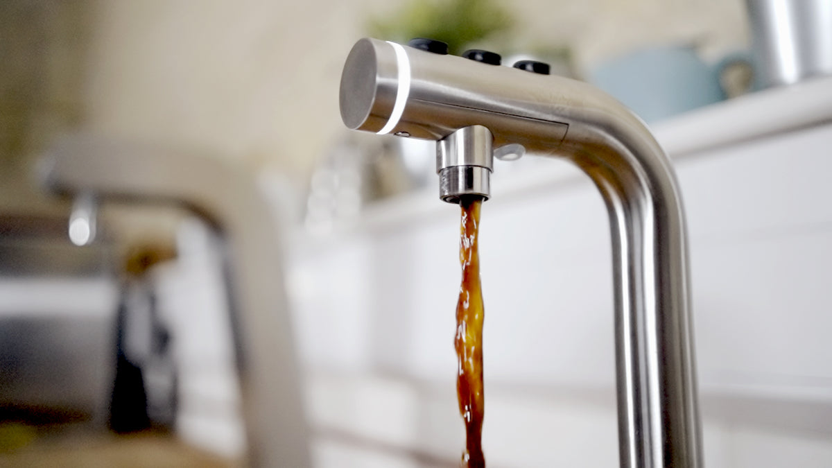 POUR'D pouring cold coffee on a cafe counter